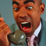 black-man-yelling-into-phone